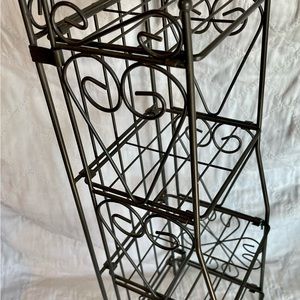 Curio storage. Metal, collapsible.